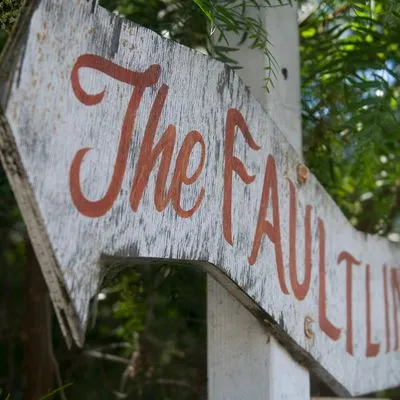 A sign that say's "The fault line"