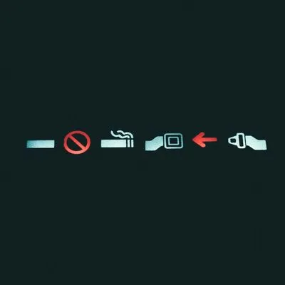 No smoking and fasten seatbelt sign from a plane.