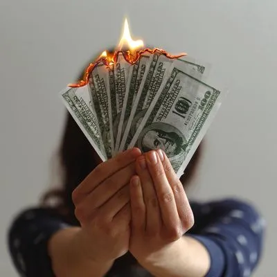 Dollar bills on fire