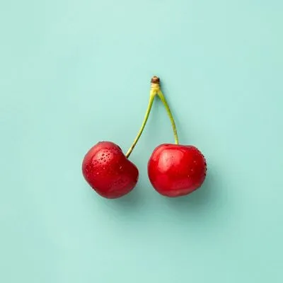 Two red cherries 