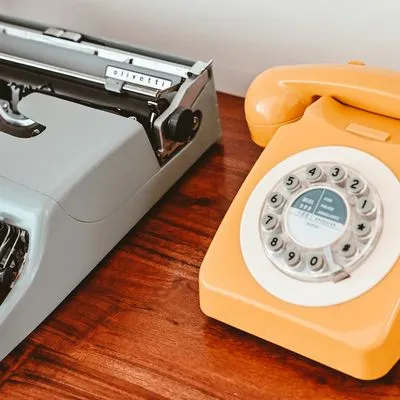 Telephone and typewriter