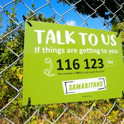 Samaritans 'Talk to Us' sign urges people to reach out for help by calling 116 123