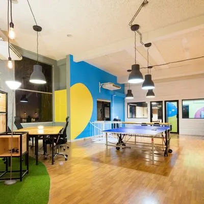 Startup office with a ping-pong table and desk